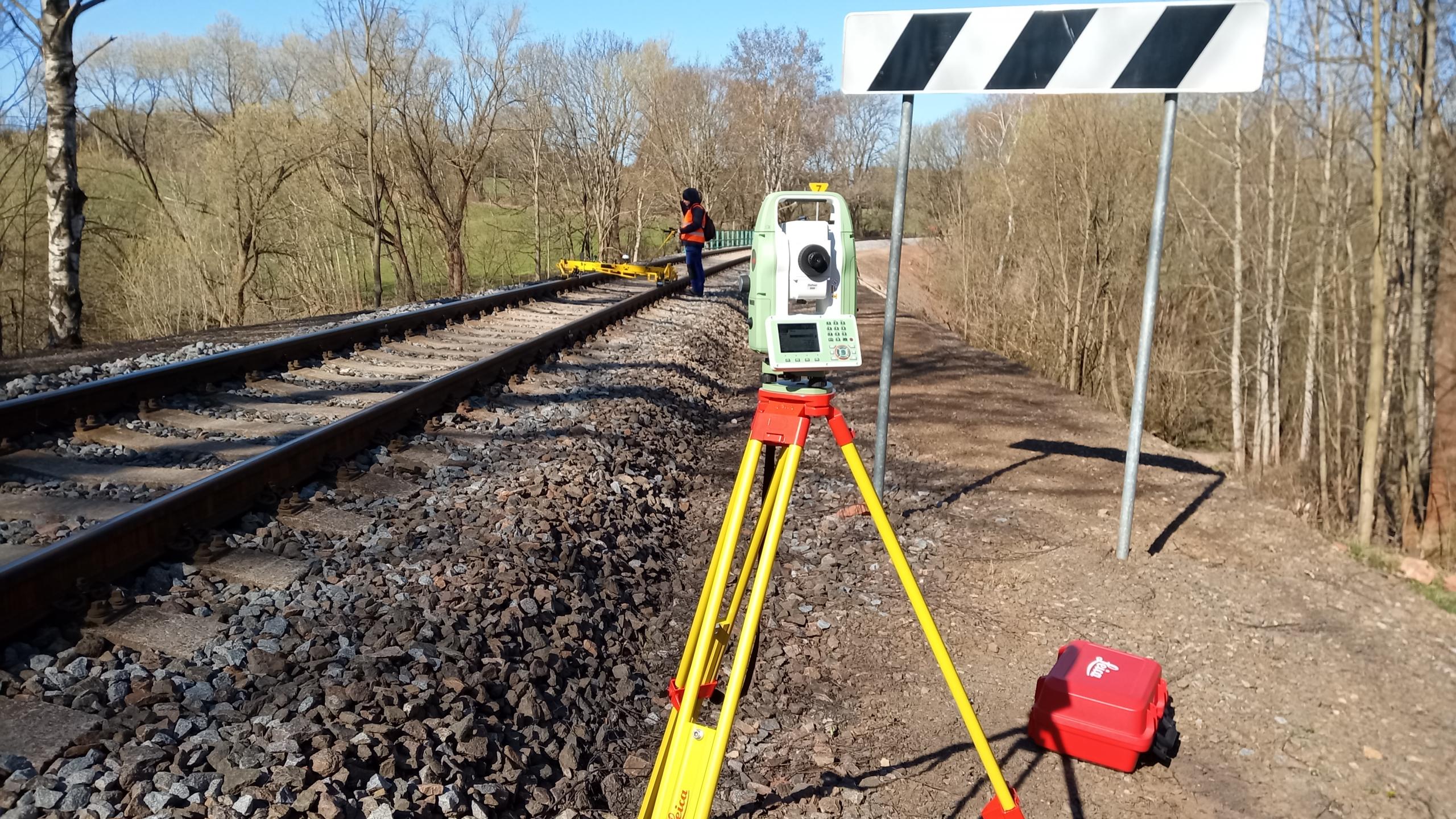 Total station and measuring trolley Krab while performing measurement of railway track alignment.