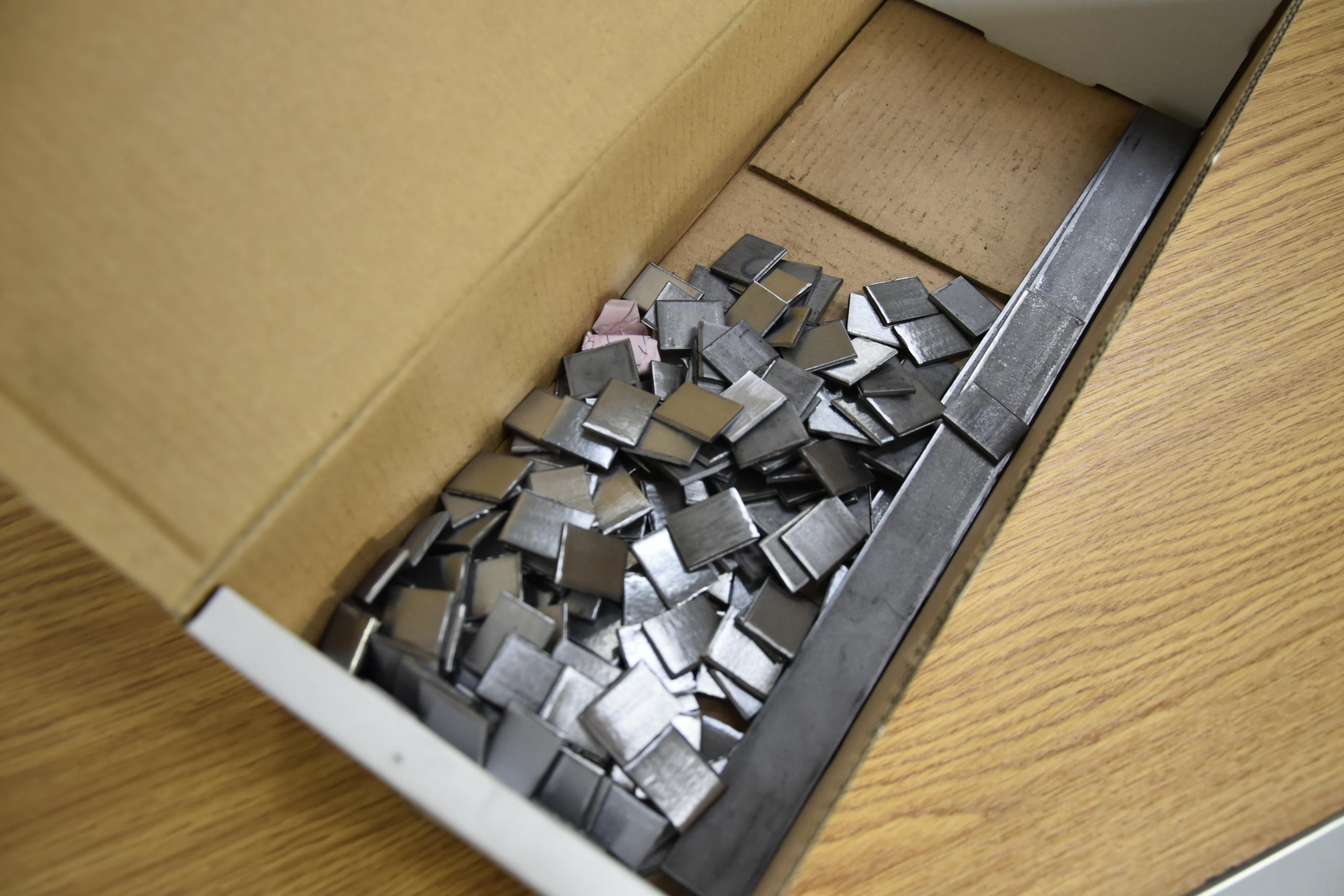 Grinded steel plates for dummy strain gauge installation.