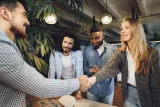 female-office-executive-shaking-hand-new-male-team-member-employee115912.jpg
